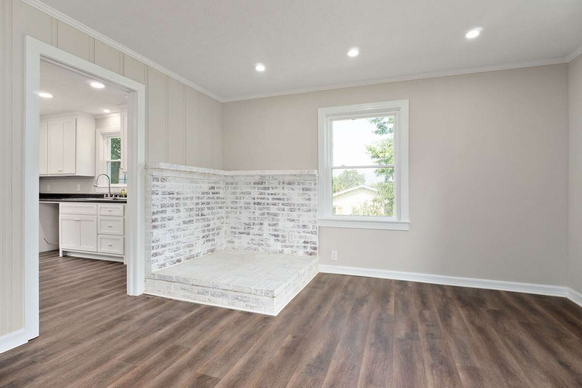 This area of the living room could be used as a dining room.