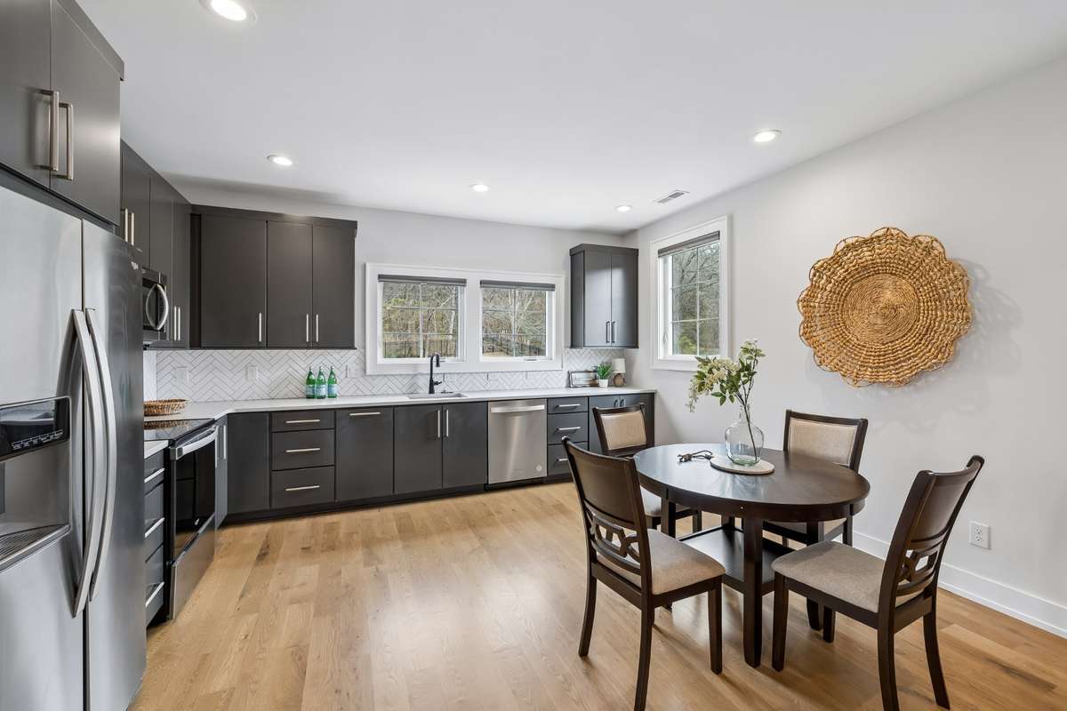 Second full kitchen is fitted with Whirlpool appliances and thoughtful designer finishes.