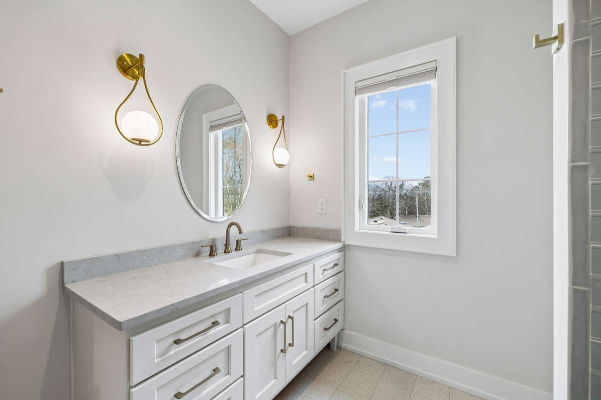 Light filled en suite bathroom.