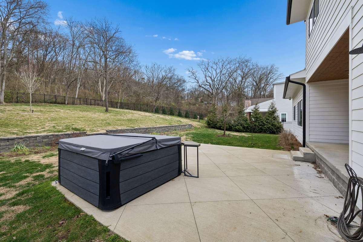 Flat backyard built with future pool construction in mind.