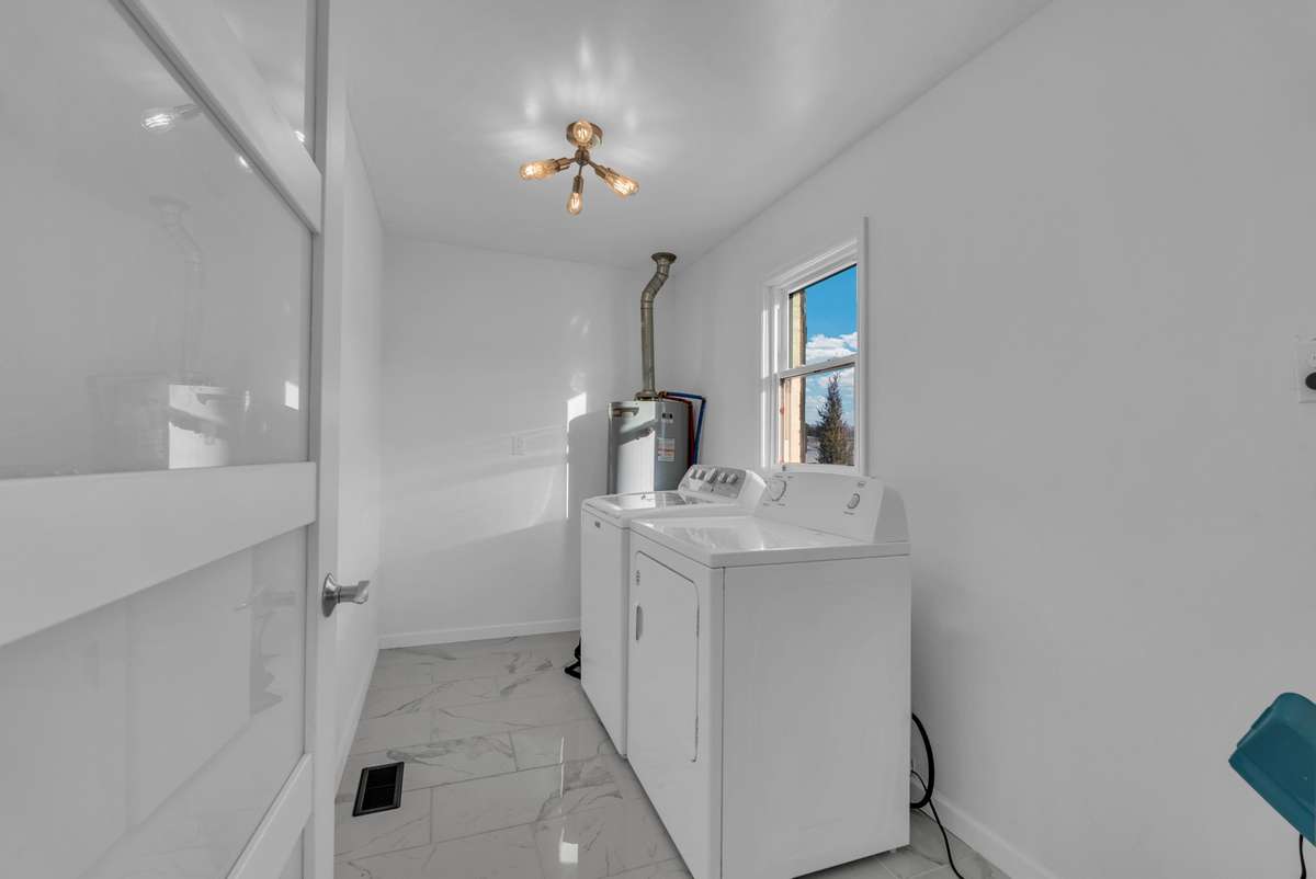 Laundry room with washer and dryer
