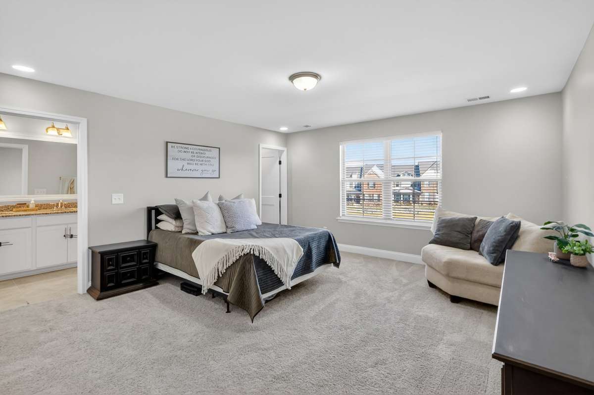 Expansive primary suite on the second floor