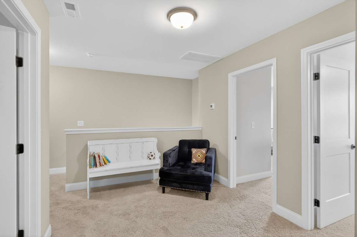Upstairs landing with cozy seating area