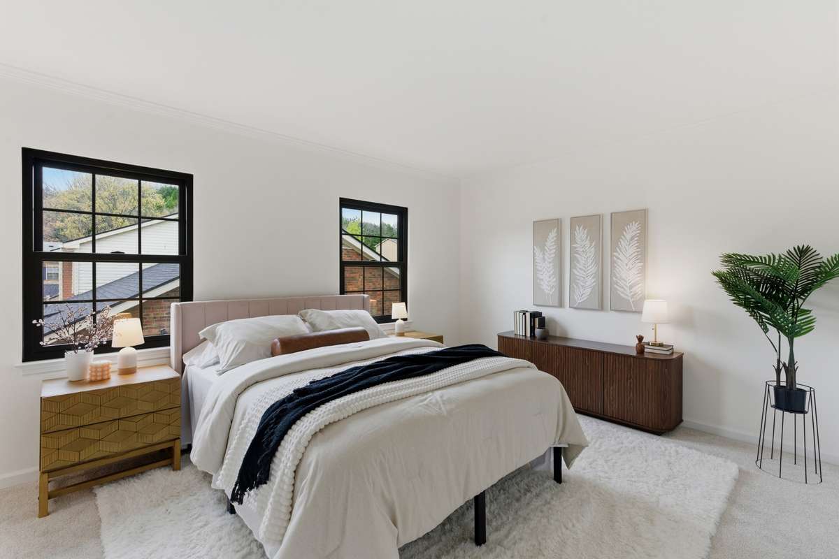 Spacious Primary Bedroom has plenty of space for a king or queen bed plus dressers, etc.