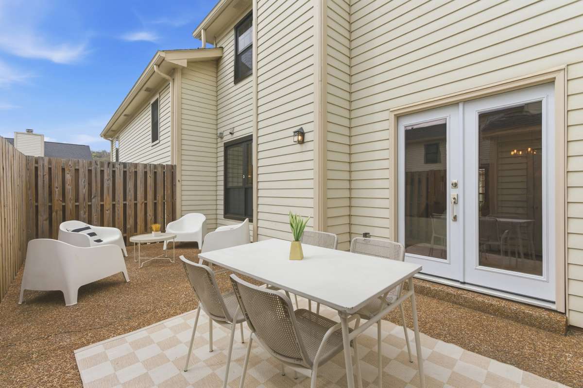 Patio large enough for dining + lounge area, maybe even some raised garden beds?
