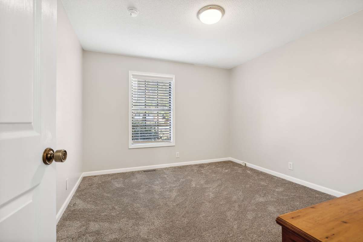 Another versatile bedroom option with a closet and cozy layout.