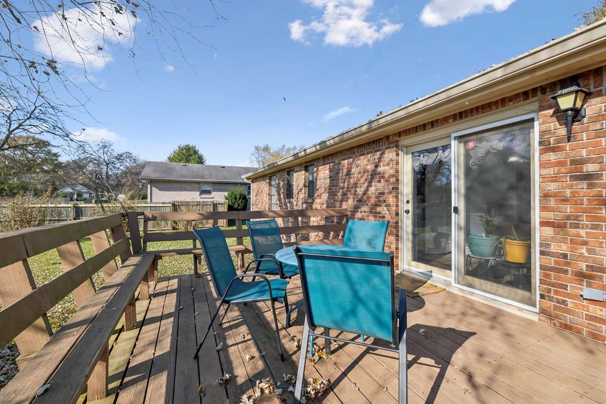 Backyard entertaining made easy with deck and patio area.