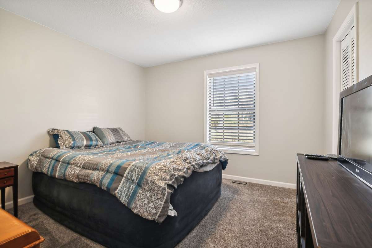 Bright additional bedroom. Perfect for guests, kids, or home office use.