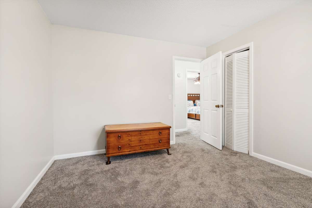 Another versatile bedroom option with a closet and cozy layout.