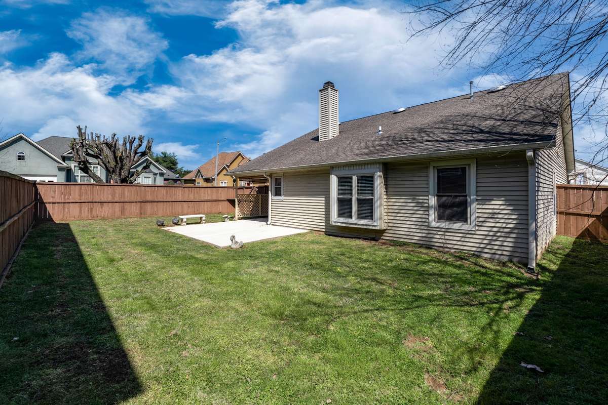 The generous size back yard with lots of green grass and private fence surrounds the property. Great for your fur baby to have the freedom to roam.
