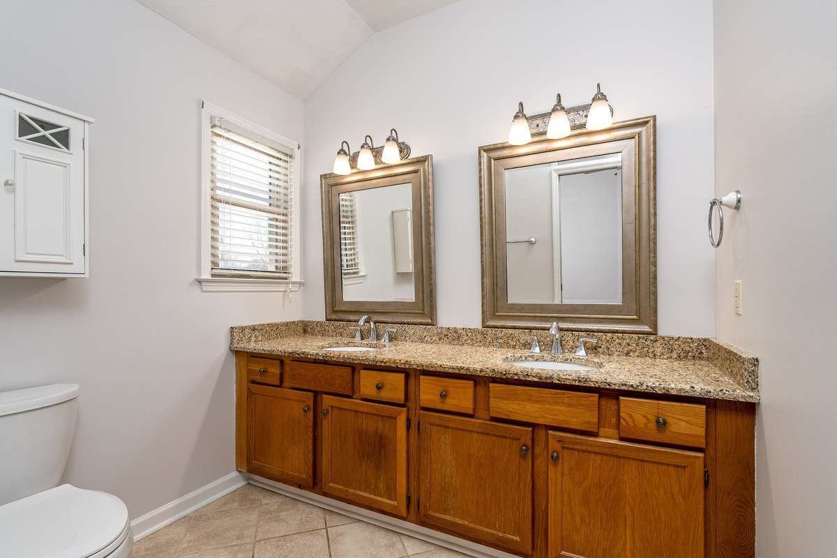 Primary Bath with double sinks and a new shower