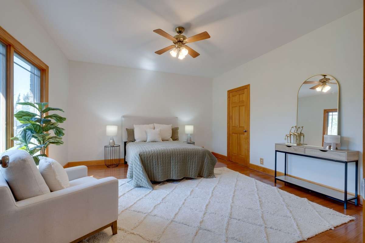 **STUNNING Primary Suite w/ Hardwood Floors**