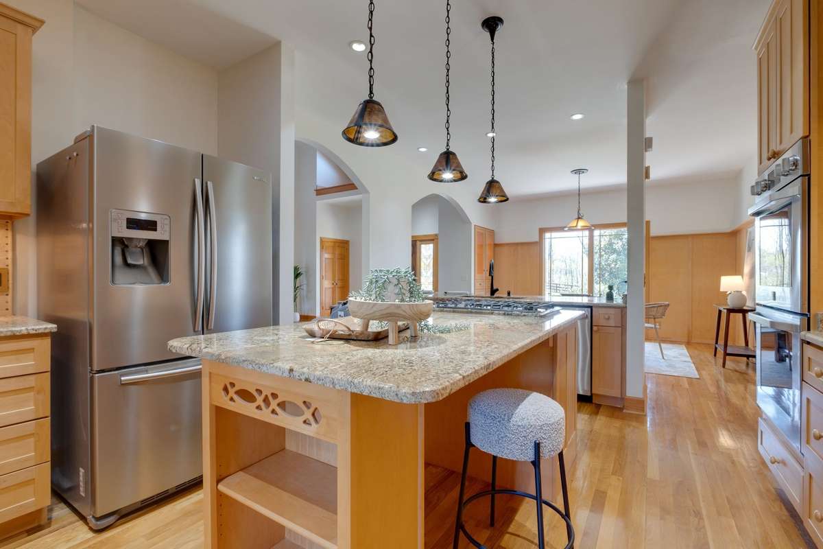 **Chef's Kitchen w/ Massive Granite Island**