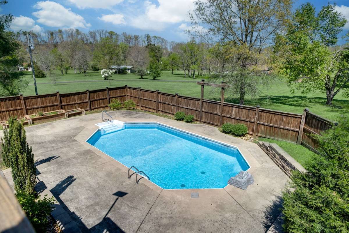 **Fabulous Outdoor Entertainment Area w/ Privacy Fencing**
NOTE: Green Grass Edits on Exterior Photos