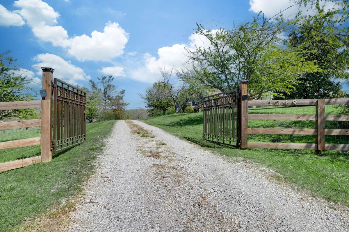 **ESTATE LOT w/ GATED ENTRANCE**
NOTE: Green Grass Edits on Exterior Photos