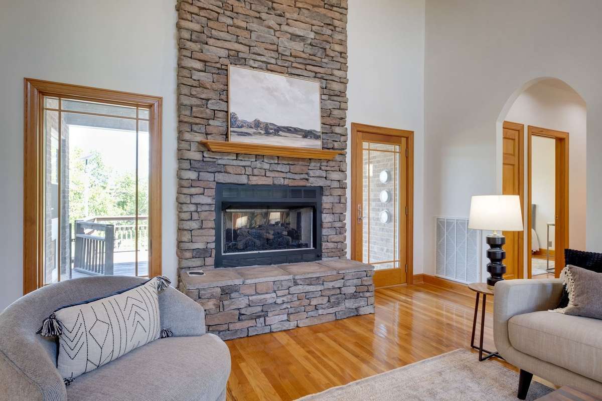 **Impressive Great Room w/ Statement Making Stone Fireplace**