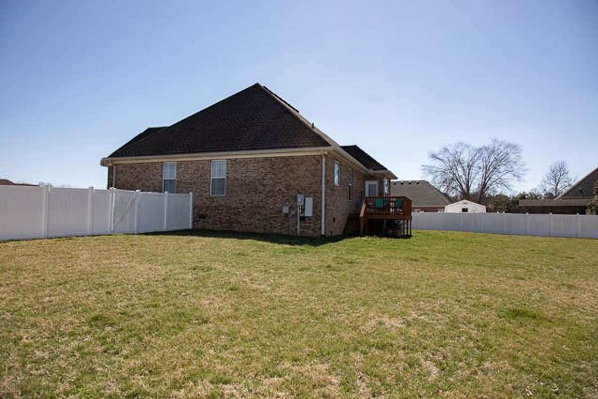 Large fenced backyard great for dogs or kids!