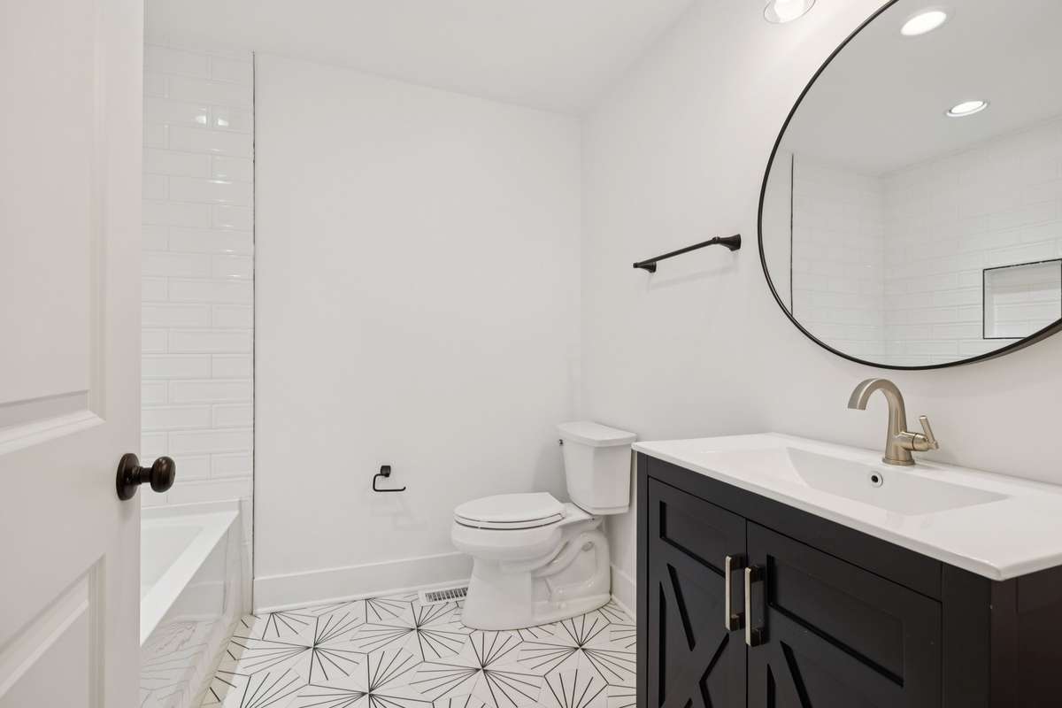 This full bathroom is located downstairs - just outside of bedroom #2.  Perfect for guest and servicing the adjacent bedroom.