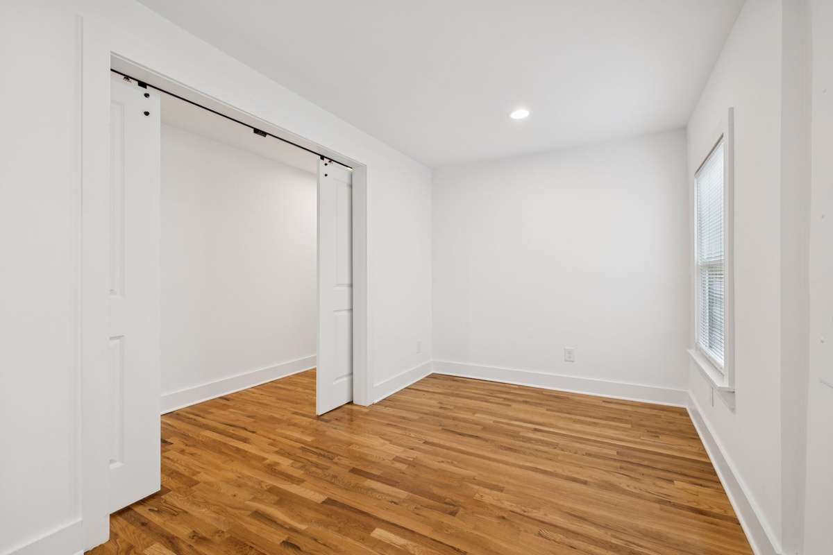 This flex space can be used as a home office.  The barn doors allow for privacy.