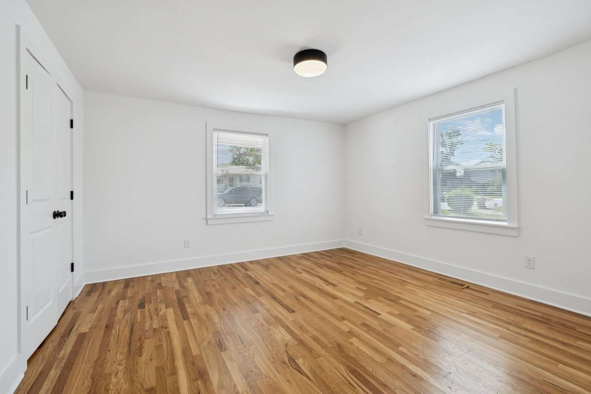 This is the second bedroom - located at the front of the house.  It has an extra large closet with two sets of double door.