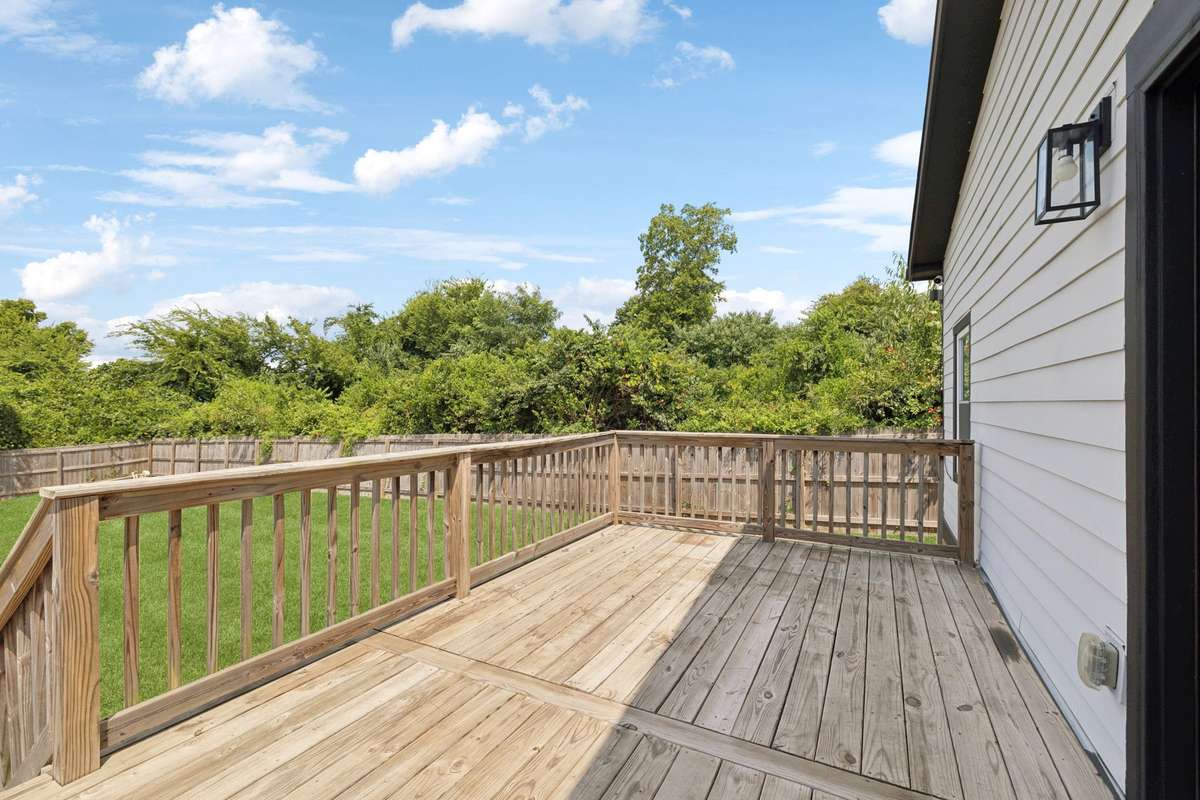 The living room's French doors open to this deck - giving you outdoor-living options.