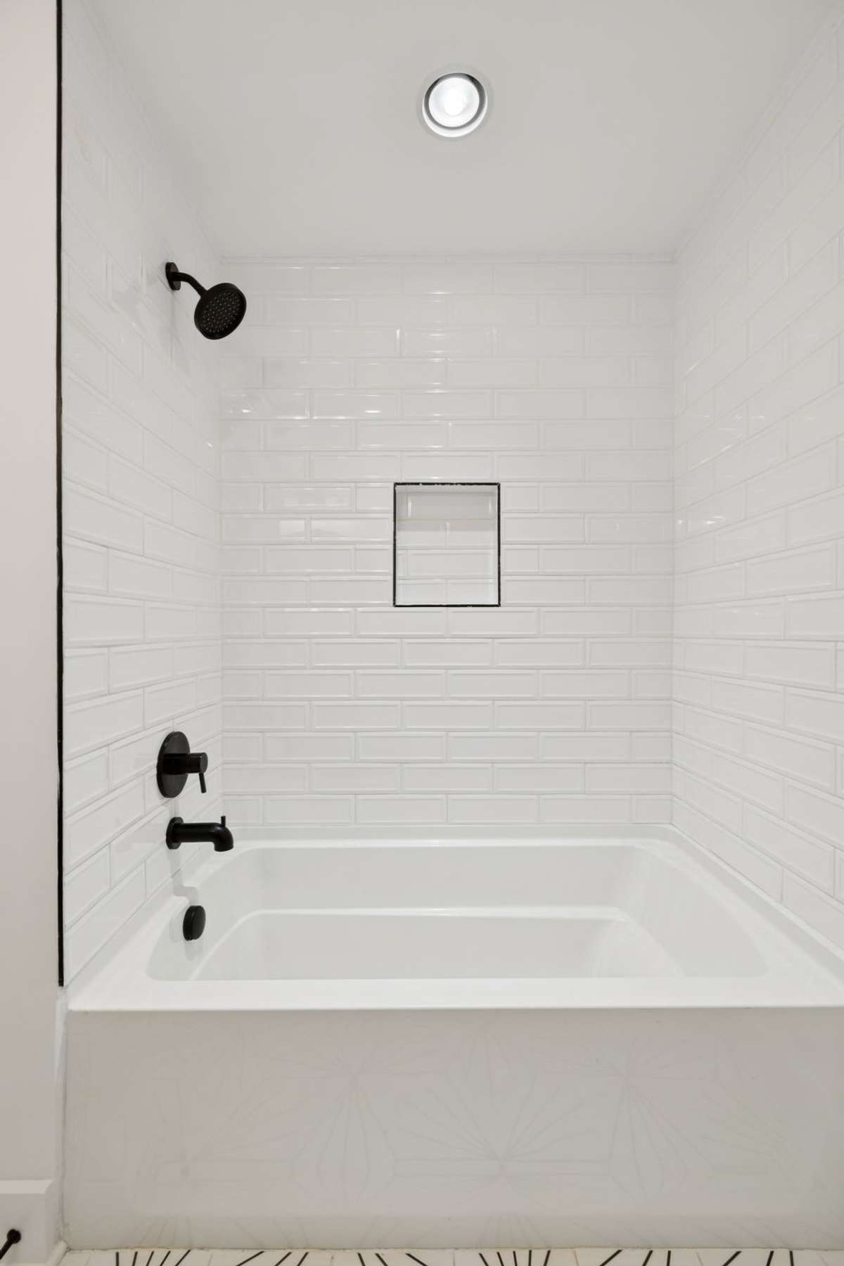 The main floor bathroom has a show/tub combo.