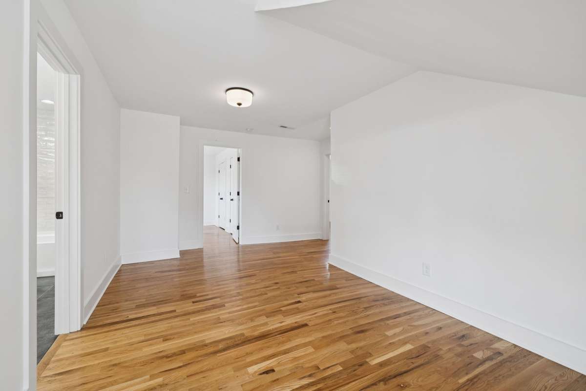This is the 20x9 flex bonus area on the second floor.  This photo does not have virtual staging.  This area can be used as a home gym, craft area, homework zone, or entertainment/tv room.