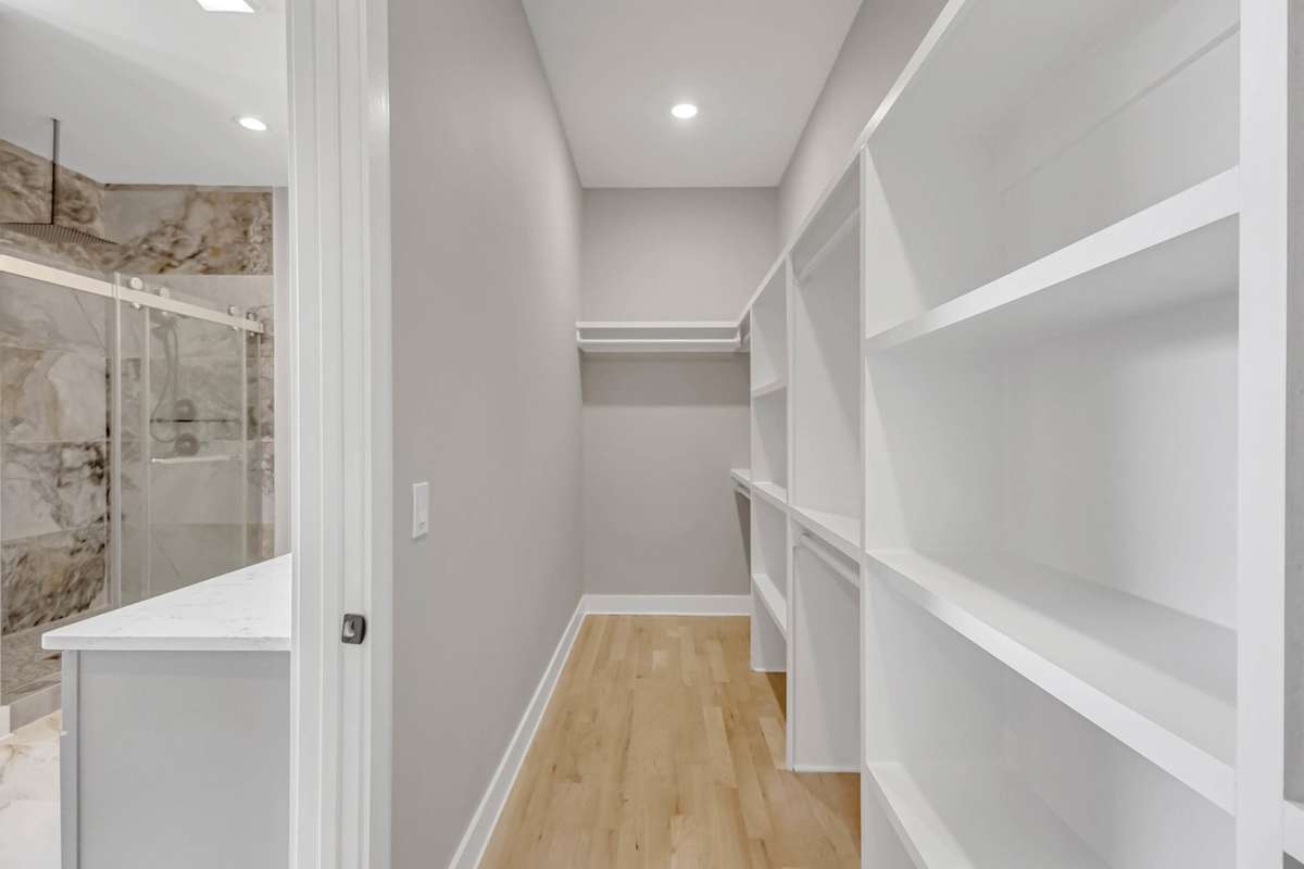 Custom shelving to keep your primary closet organized