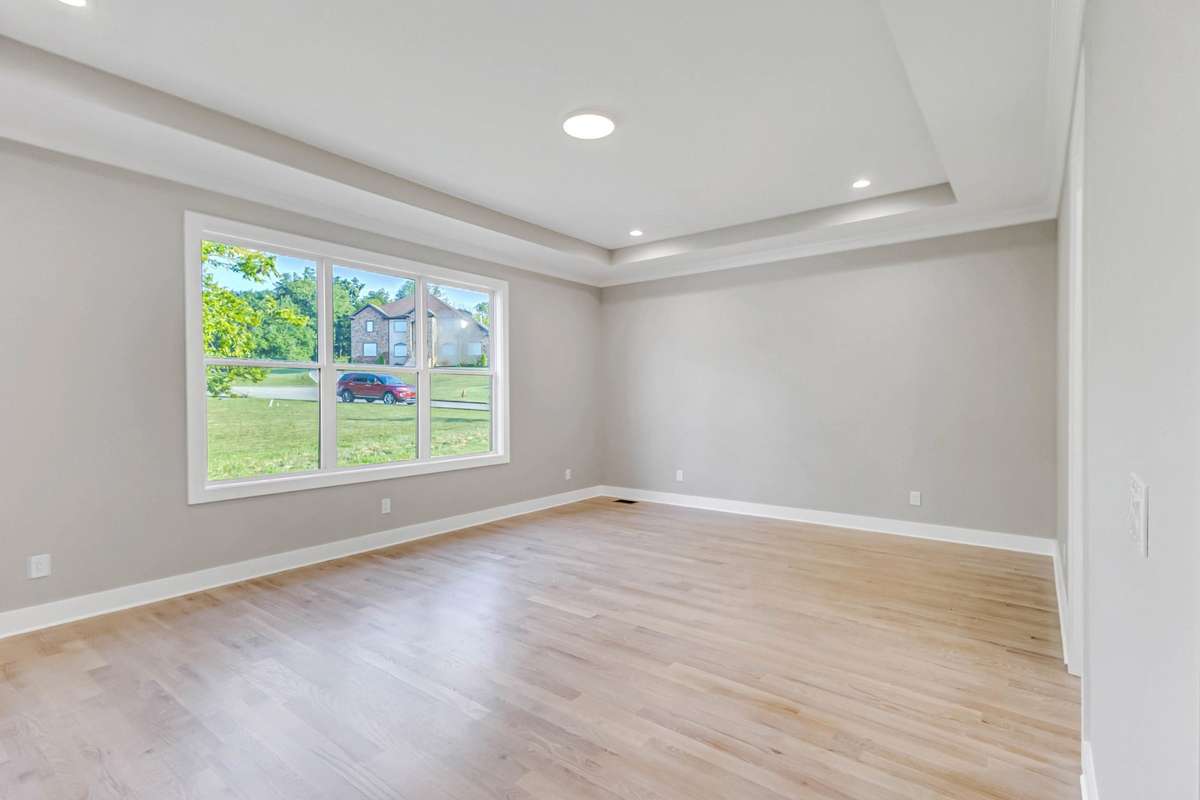 primary bedroom is on the main floor and is tucked away for privacy! A true retreat!