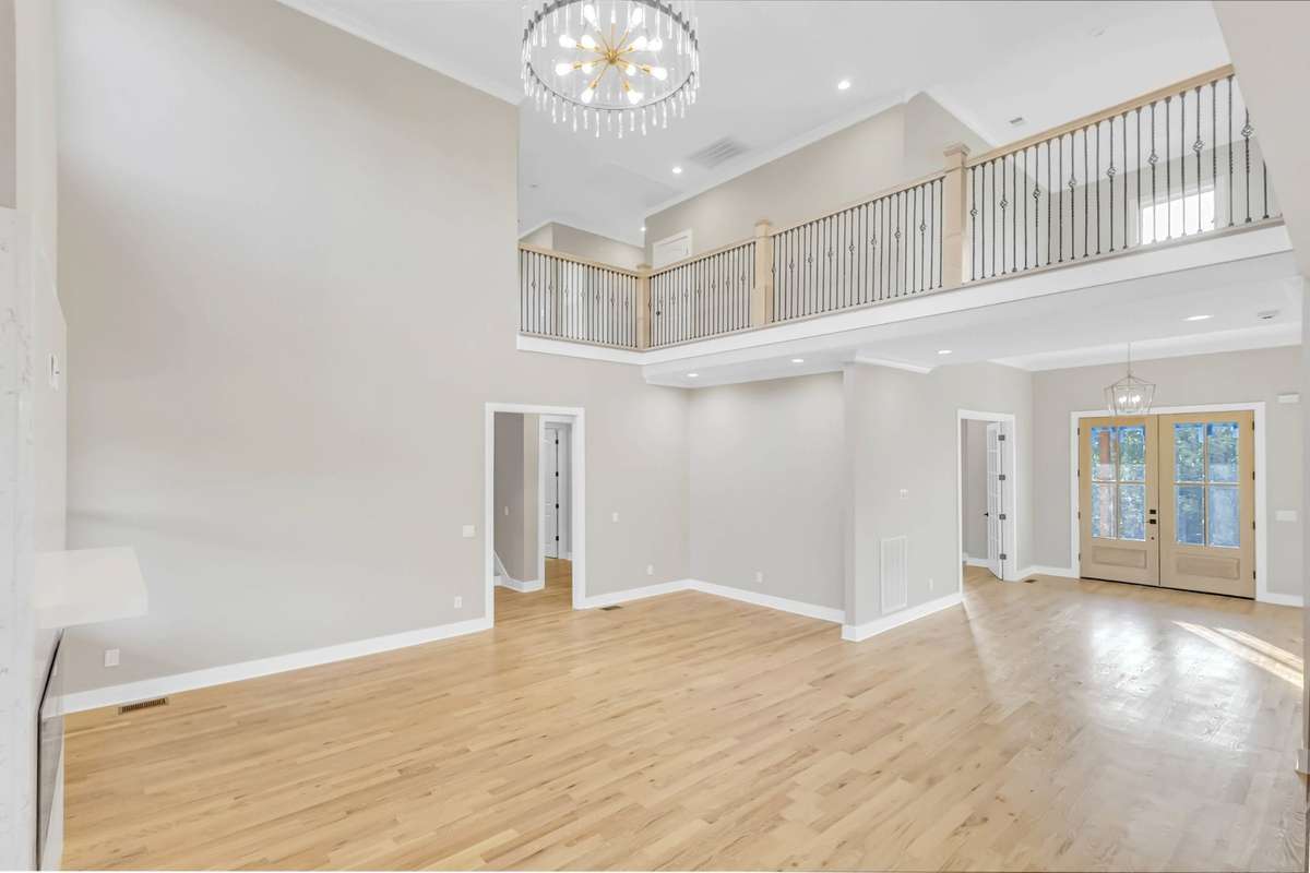 another view of the living room! Check out the statement light fixture!