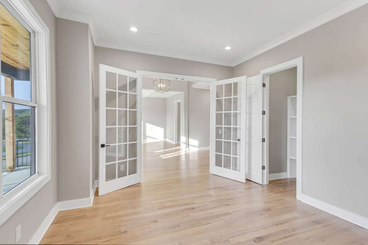 This room also has a large walk in closet with custom shelving! Could also be used as another bedroom if you need more than one main level bedroom!