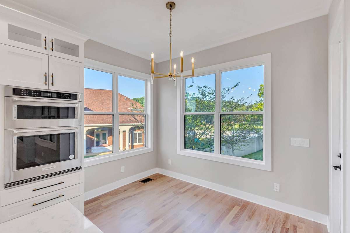 There's even a breakfast nook with tons of windows and lots of natural light for even more entertaining space!