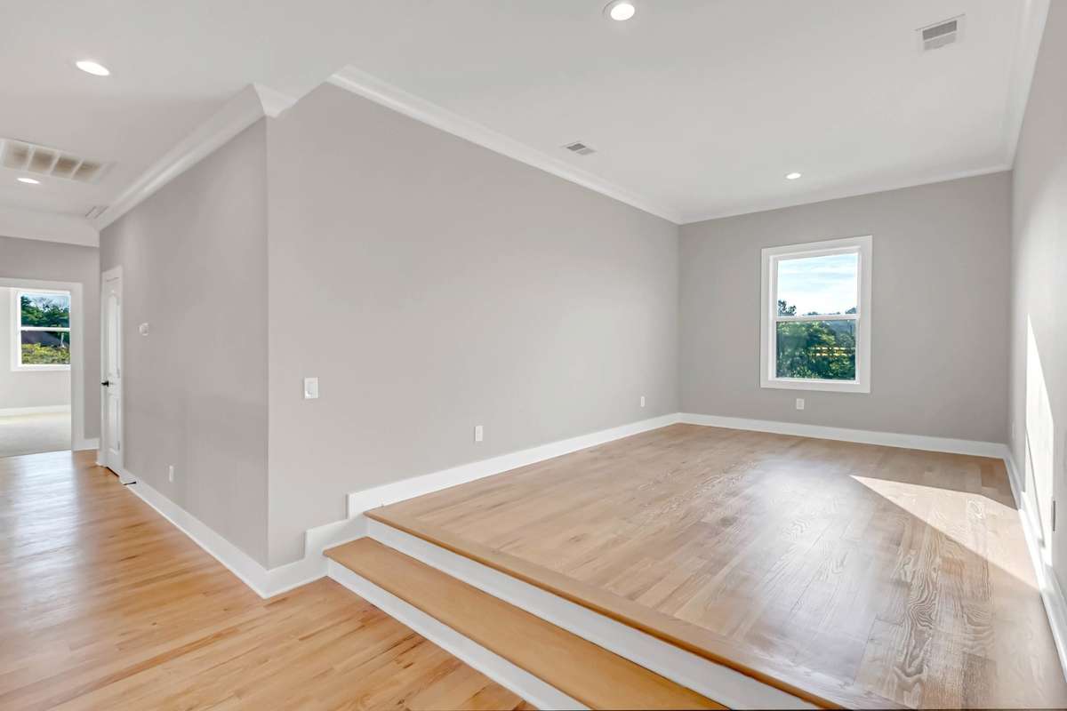 This upstairs nook is open to the catwalk and is big enough for a pool table-or anything you can imagine! Check out the next two virtually staged images for just a couple of ideas!