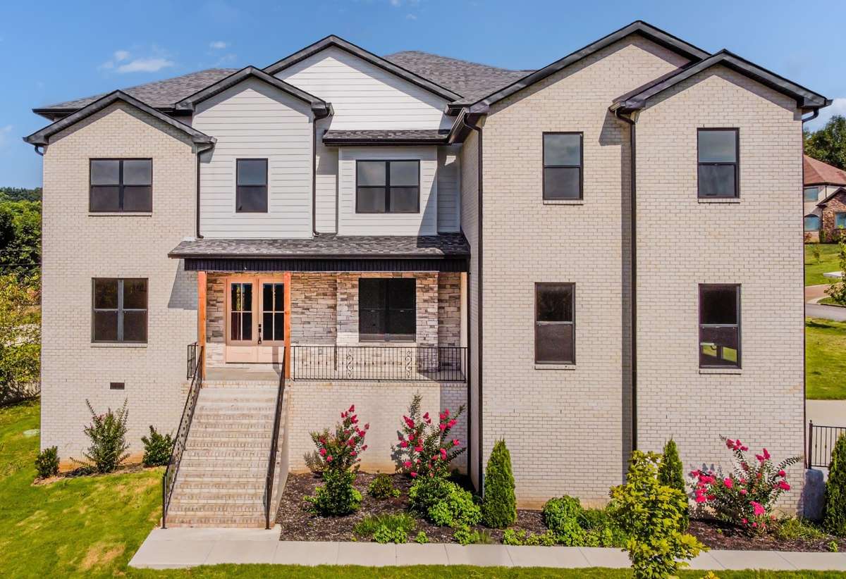 This grand beauty is in a gated community but so close to all of the conveniences of the city!