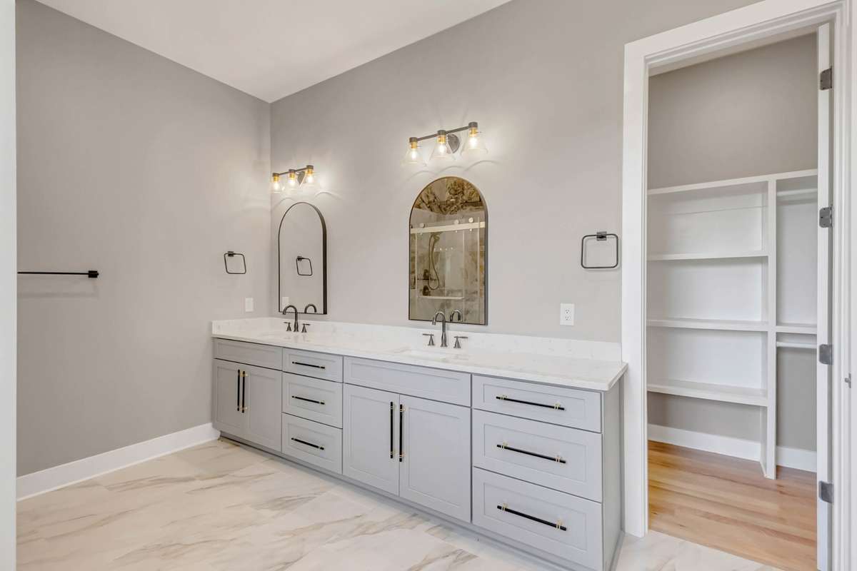 The double vanity offers so much storage for all of your lotions and potions!