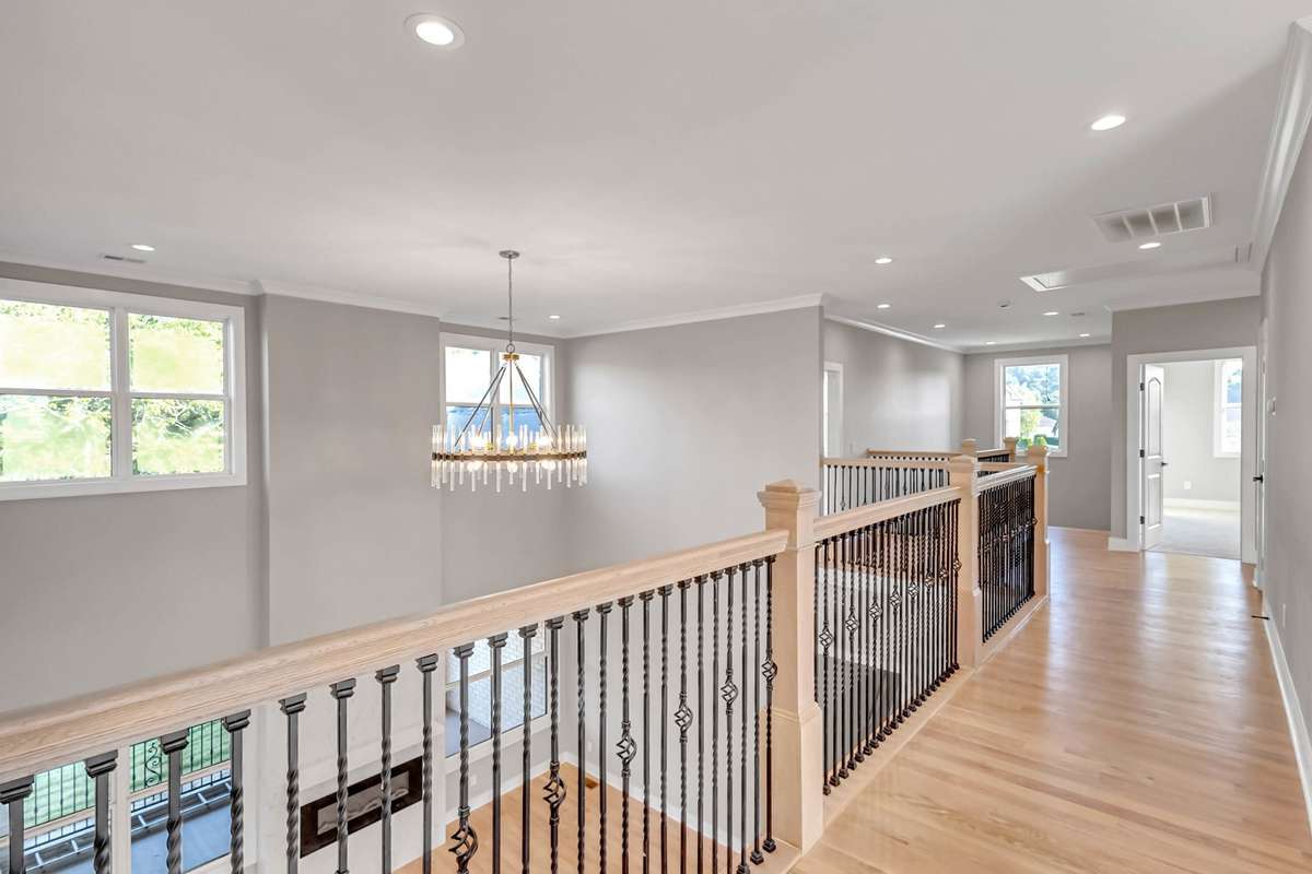 The catwalk provides a great view of living area and is bathed in natural light from all the windows!