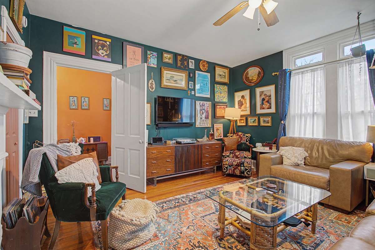 Family room in the front of the home with Fireplace has a closet and could be 3rd Bedroom.