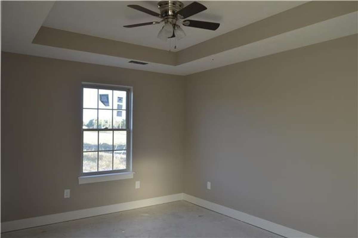 Large Owner's Retreat with Trey Ceiling.  Picture of Previous Similar House.