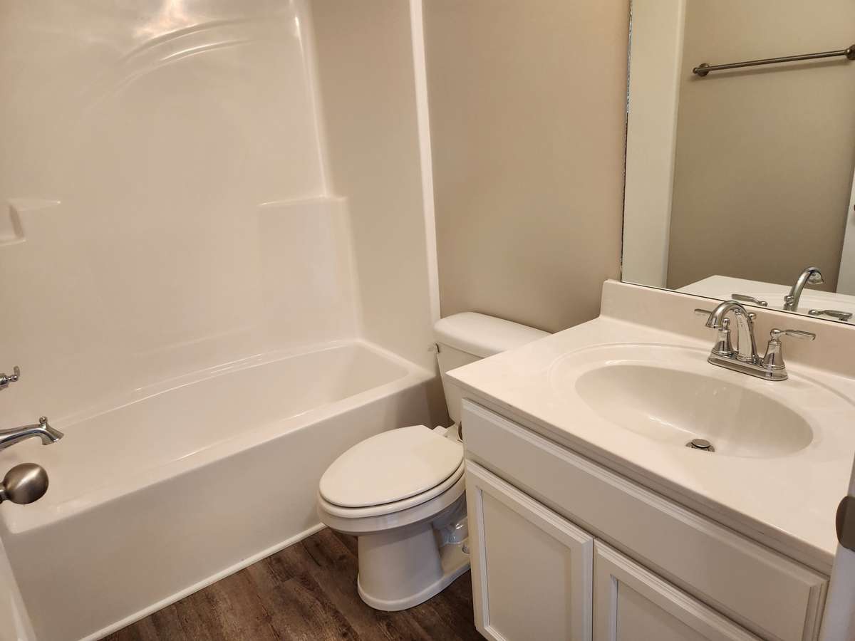 Hall Full Bath will have Custom Cabinets and Tub/Shower Combo 
Picture of Similar House.
