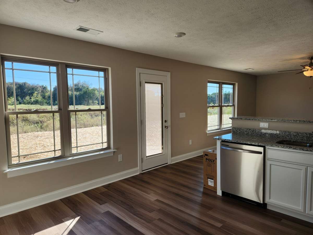 Large Kitchen with Plank Flooring & Double Windows.
Picture of Previous House.