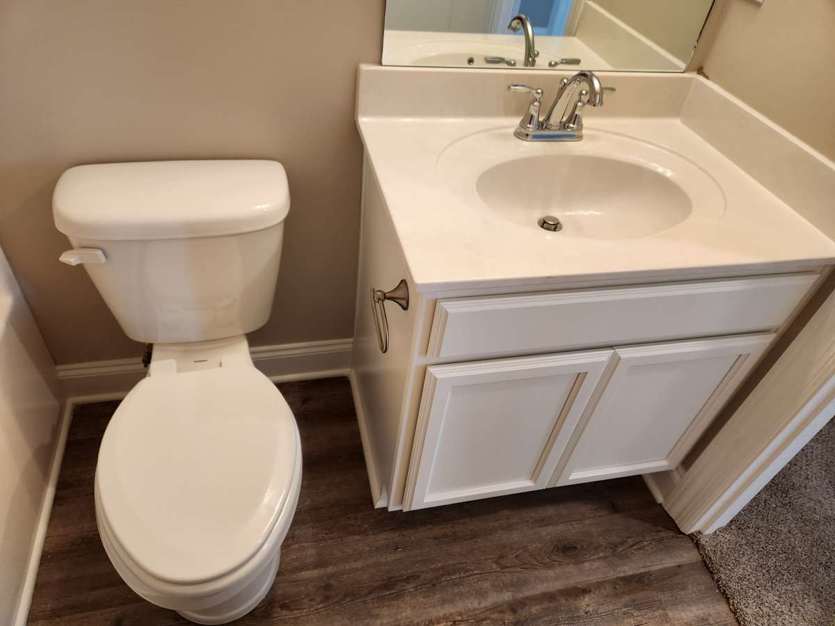 Full Baths will have Custom Cabinets.  
Picture of Similar House.