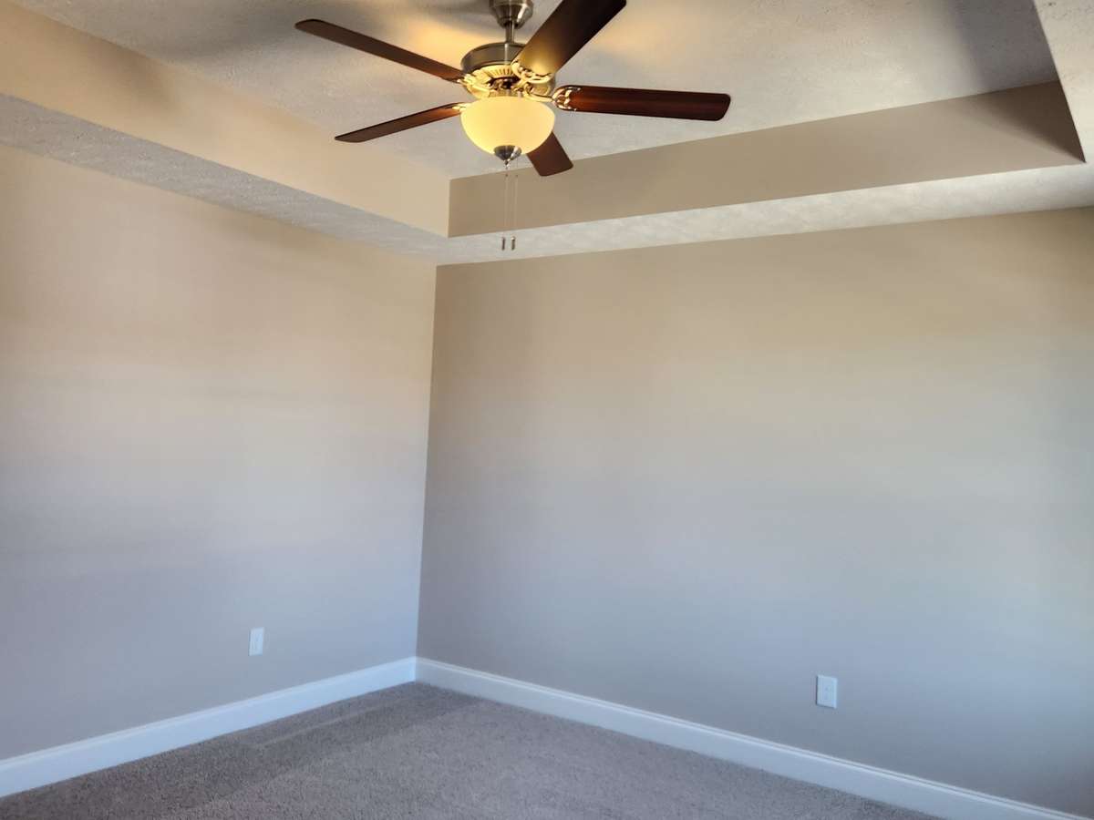 Primary Bedroom has a Nice Trey Ceiling and Ceiling Fan.
Picture of Previous House.