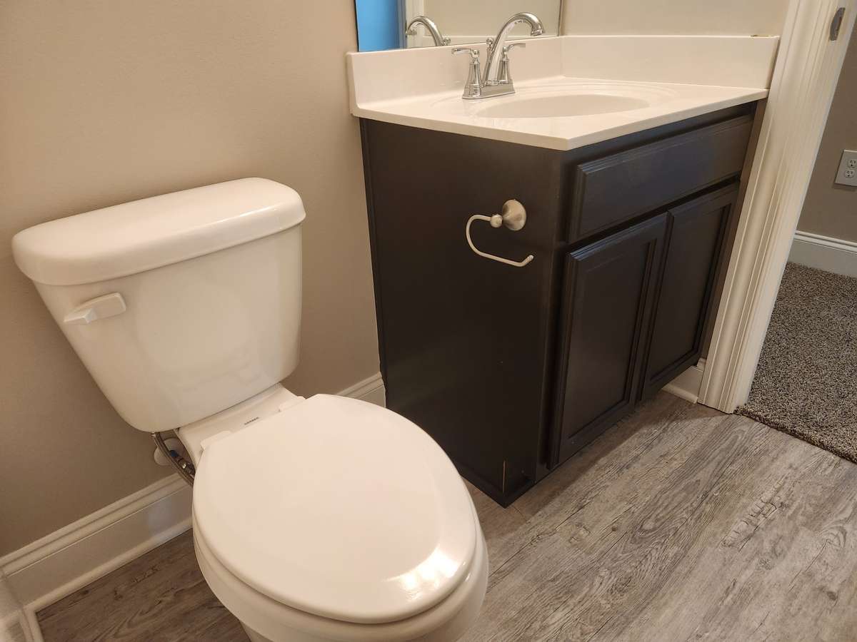 Buyers can choose Dark Gray, Brown or White Cabinets for Bathrooms and Kitchen if not already ordered.  
Picture of Similar House.