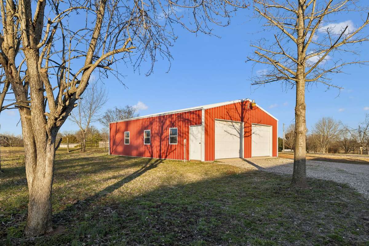 Detached garage/workshop offering excellent functionality...