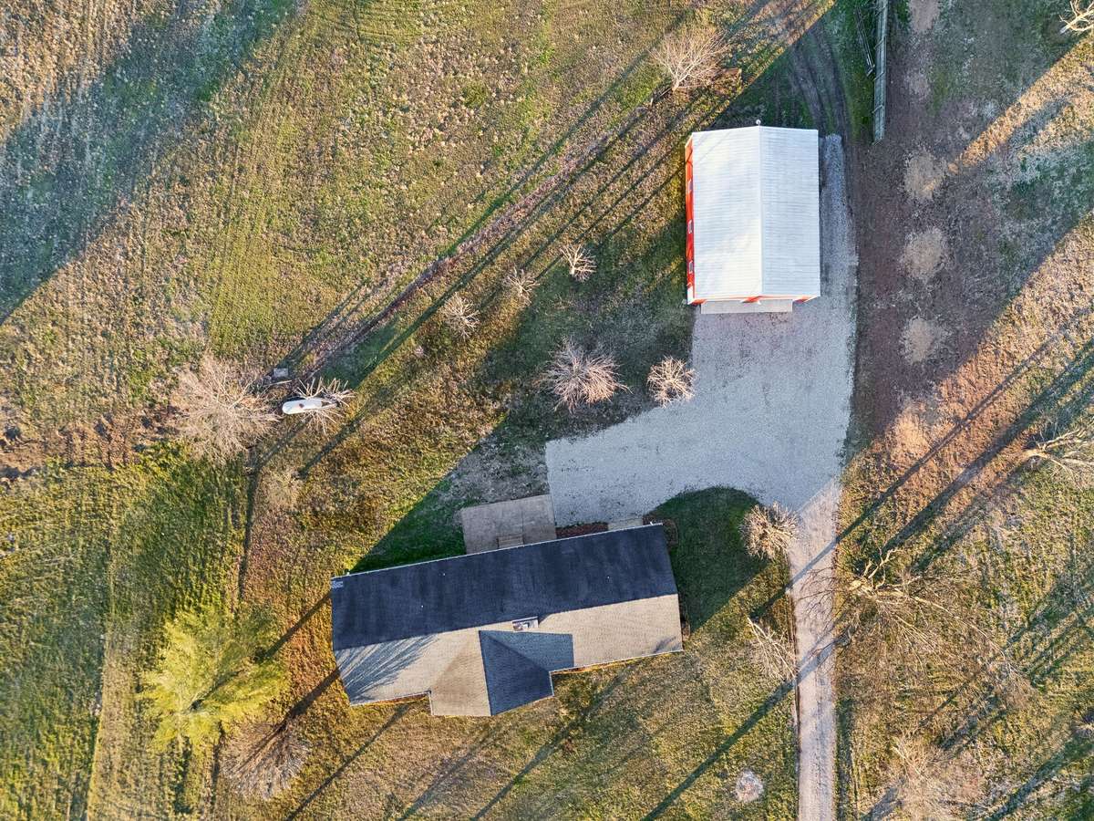 Expansive lot with ample space between structures...
