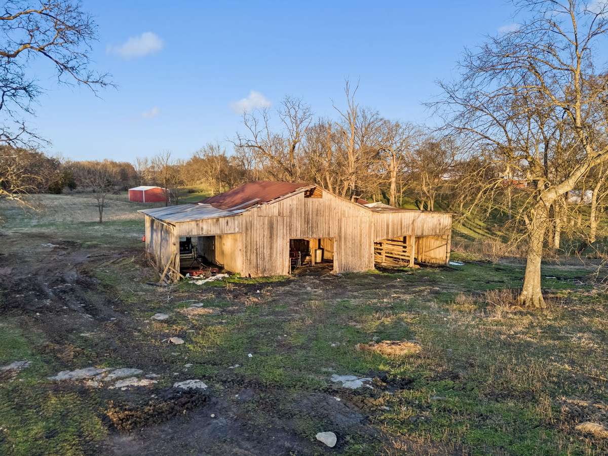 A true country setting with barn and open land...