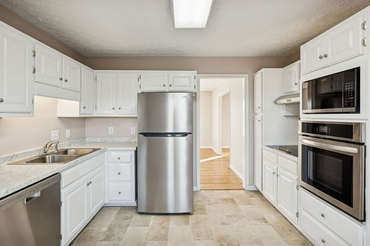 Streamlined cooking area with ample storage...