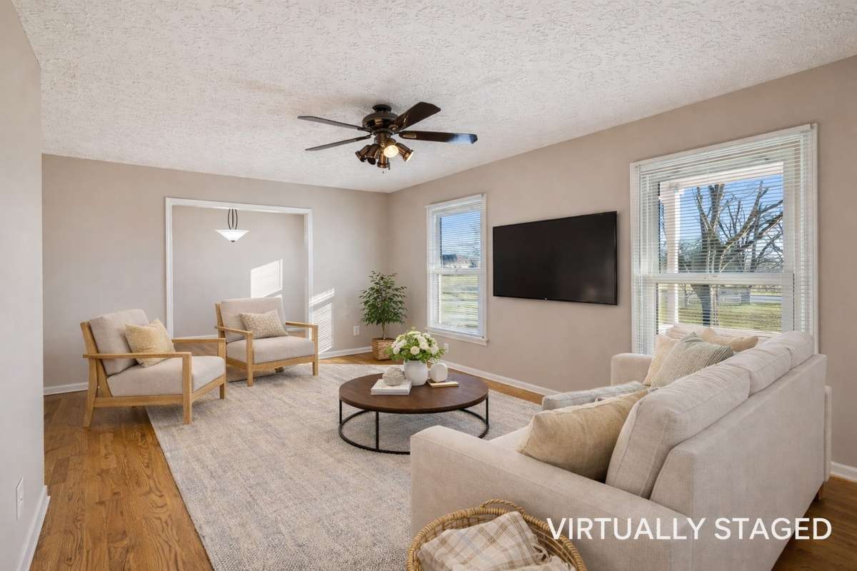 Classic ranch layout with defined formal living space...