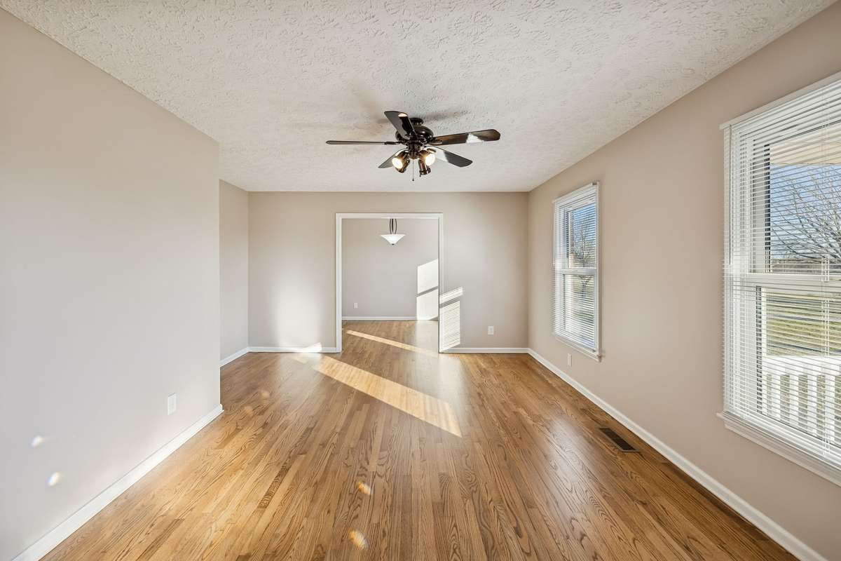 Comfortable living room just off formal dining area...