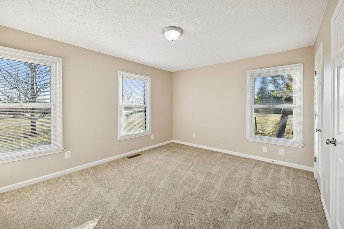 Rest easy in this quiet and comfortable primary suite..